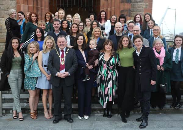The Mayor of Derry and Strabane, councillor Maoliosa McHugh, with cast and crew from the hit TV programme Derry Girls with family and friends at the reception in the Guildhall.