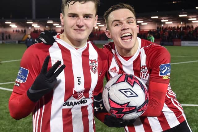 Derry City striker Ronan Hale celebrates with his brother Rory after netted a hat-trick on his Brandywell debut on Monday night.