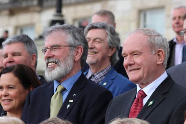 Gerry Adams pictured with Martin McGuinness.