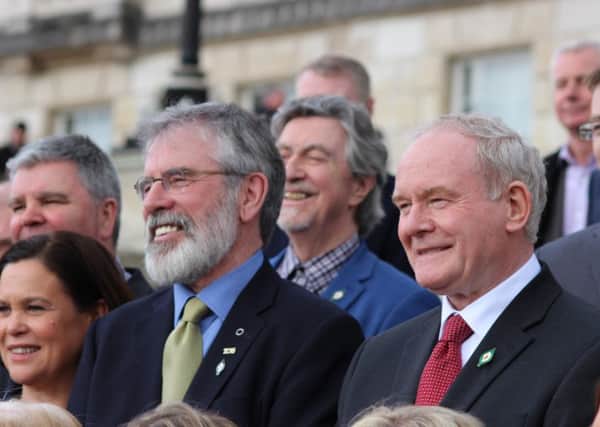 Gerry Adams pictured with Martin McGuinness.