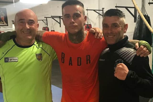 Eamon Deane with Oakleaf coaches Eamon McCauley and Christy Doherty ahead of tonight's international boxing show at the Maldron Hotel.