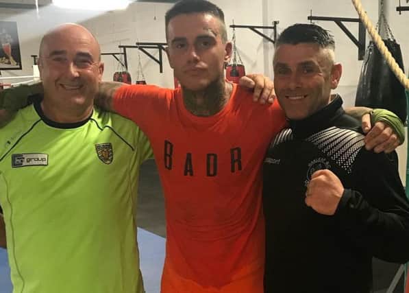 Eamon Deane with Oakleaf coaches Eamon McCauley and Christy Doherty ahead of tonight's international boxing show at the Maldron Hotel.