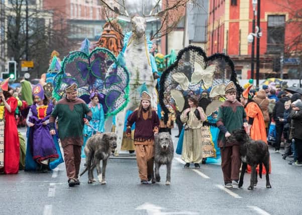 Three Irish Wolfhounds lead a previous Derry City and Strabane District Council's the annual Spring Carnival on St. Patrick's Day in Derry.