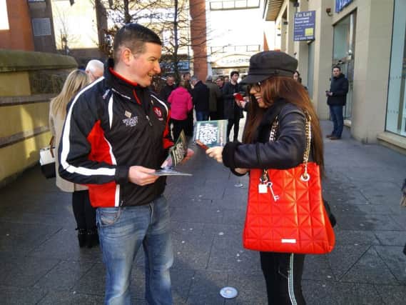 Councillor Colly Kelly  pictured working on the passport campaign in Derry City centre recently