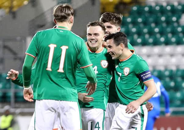 Rory Hale of Republic of Ireland celebrates scoring a goal with teammates.