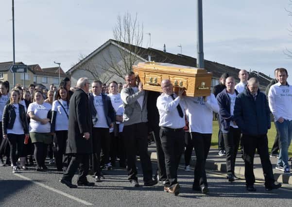 The funeral cortege for Michael McGinley makes its way from his aunts home in Strabane Old Road, yesterday, to St. Columbs Church Waterside for Requiem Mass. DER138GS026