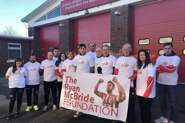 Some of Ryan McBride's family, including his father Lexie, pictured at the PFAI's FAI Cup Final run in aid of the Ryan McBride Foundation last year.