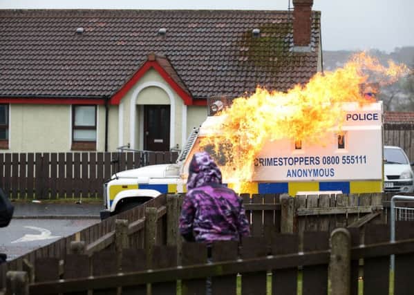 The PSNI were hit with petrol bombs and projectiles on Monday. 
Photo by Kelvin Boyes / Press Eye