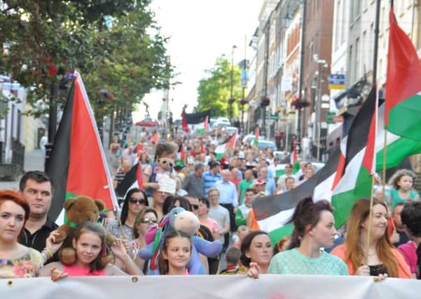 A section of the crowd at a previous rally making its way down Shipquay Street.