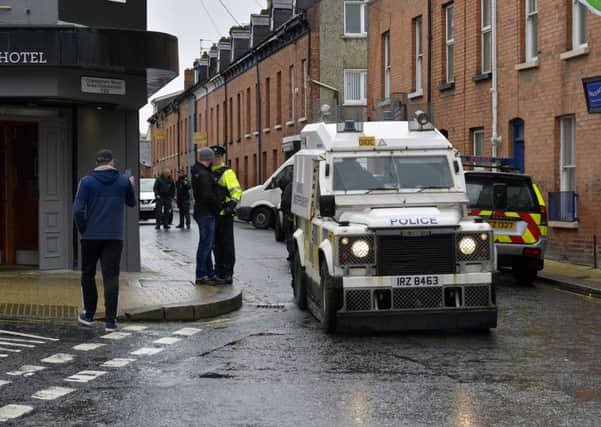 The scene at the PSNI search of Junior McDaid House in Chamberlain Street. DER1418GS013