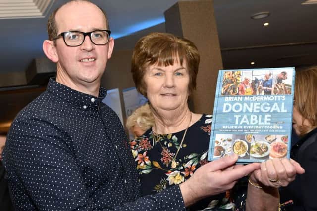 Ulster Regional Best Local Food Hero: Chef Brian McDermott pictured with his proud mum, Mary, at the recent launch of his Brian McDermott's Donegal Table book in the Redcastle Hotel. DER1018-140KM