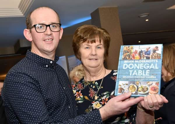 Ulster Regional Best Local Food Hero: Chef Brian McDermott pictured with his proud mum, Mary, at the recent launch of his Brian McDermott's Donegal Table book in the Redcastle Hotel. DER1018-140KM