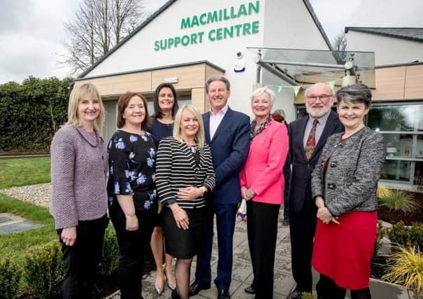 Members of the Macmillan NI and Western Health and Social Care Trust teams pictured with guest speaker, Adrian Dunbar at the official opening event.