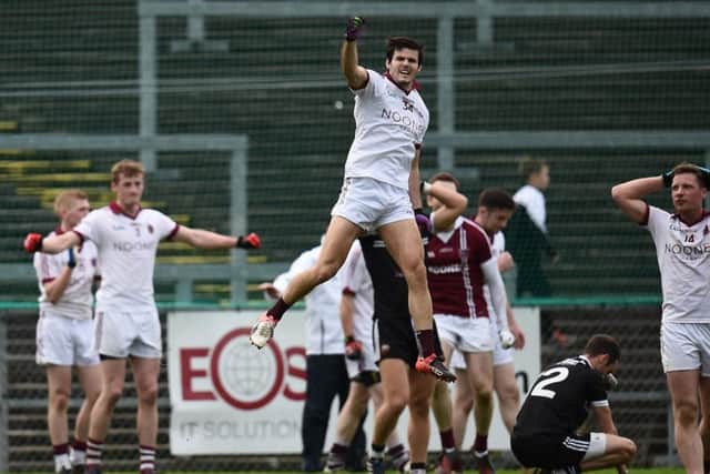 Karl McKaigue is one of the Slaughtneil quartet named on the inaugural AIB Football Club Championship Team of the Year.