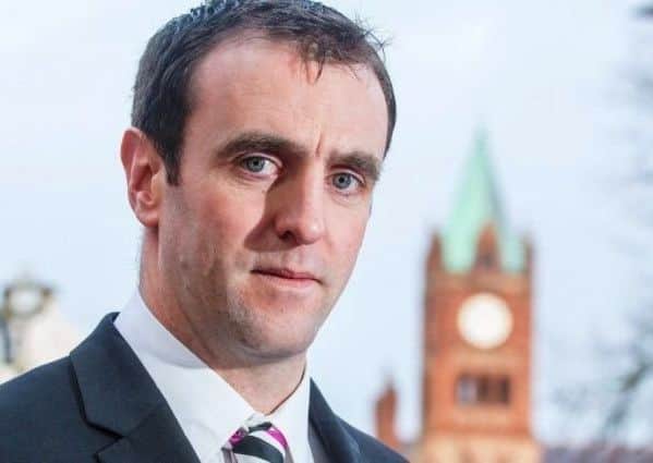 Mark H Durkan.