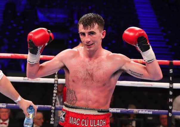 Tyrone McCullagh raises his hand in victory after defeating Jose Aguilar on his last visit to Odyssey Arena.