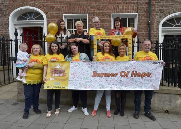 Members of the Darkness into Light Committee pictured with HURT representatives at the recent launch of the Derry Darkness into Light 5k Walk/Run which will take place on Saturday 12th May next at 03.45 from Sainsburys cafÃ©. DER1618GS017