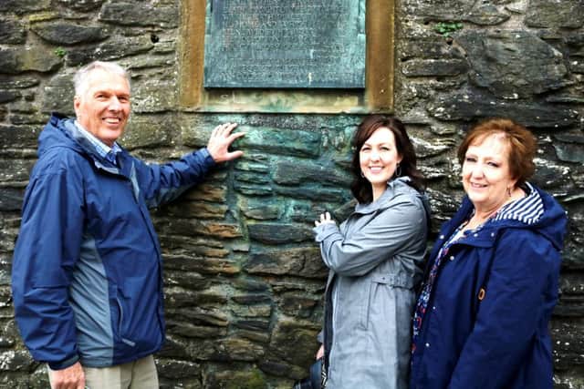 Dan Hull, Ashley Wright and Elaine Browning view Derry Walls. Photo: Mark Lusby.