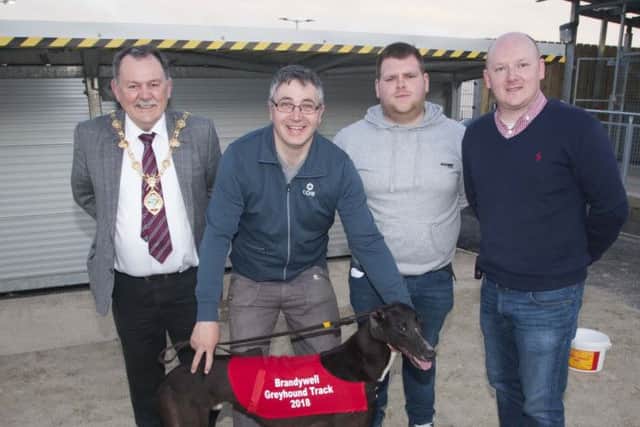 FIRST WINNER!. . . . Ã¢Â¬ÃœGhetto LeaderÃ¢Â¬", first winner at the new Brandywell Dog Track on Thursday night pictured with the Mayor, Maoliosa McHugh, owners Cyril OÃ¢Â¬"Hagan and James Lafferty and Daniel McLaughlin, Brandywell Greyhound Supporters Group.
