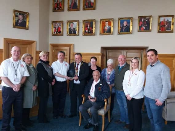 Attendees at a reception held in the Guildhall this week to mark the 25th Anniversary year of the Foyle Search and Rescue.