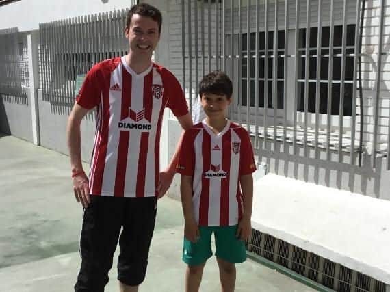 Jason Mallon pictured with his pupil Lucas Martinez.