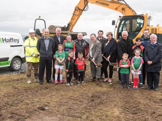 The Mayor of Derry City and Strabane District Council, Councillor Maolosa McHugh, performs the official sod turning ceremony to mark the start of works on the eagerly anticipated redeveloped sports pitches and facilities in the Top of the Hill area of the city. The pitches will be built on the site of the former Immaculate Conception College on Trench Road and will include a new grass floodlit GAA football pitch. Included are players from Doire Trasna, stakeholders and members of the local community. Picture Martin McKeown. Inpresspics.com. 01.05.18