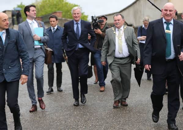 The EU's chief Brexit negotiator Michel Barnier (centre) on a walk about in Derry city. PRESS ASSOCIATION Photo. Picture date: Tuesday May 1, 2018. See PA story POLITICS Brexit. Photo credit should read: Niall Carson/PA Wire