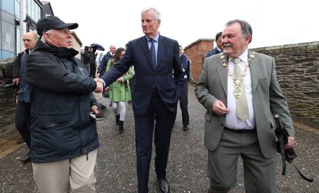 Michel Barnier enjoying a tour of Derrys Walls during his visit to the city on Tuesday.