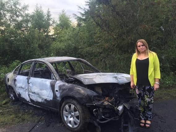 Sinn Fein Colr. Sandra Duffy pictured previously during a spate of cars being torched at Ballyarnett Country Park.