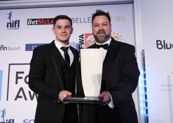 Institute's Michael McCrudden receives the Sodexo Championship Player of the Year award from Derek Coulter of Sodexo, at the NI Football Awards at the Crowne Plaza Hotel. Kelvin Boyes/Press Eye