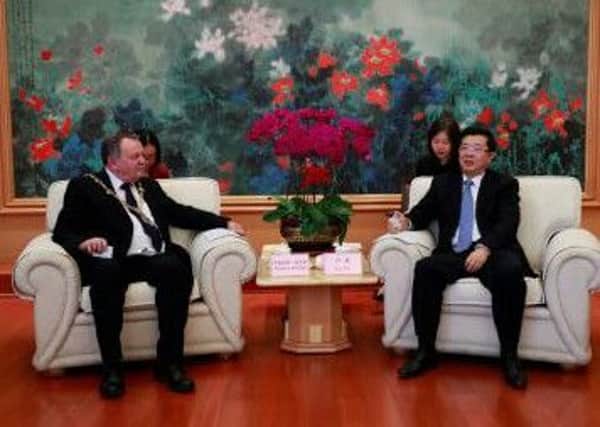 Mayor McHugh pictured with officials from China during the visit.