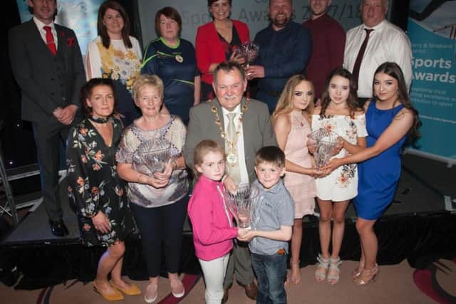 The Mayor of Derry City and Strabane District Council, Councillor Maoliosa McHugh pictured with group award winners at the DCSDC Annual Sports Awards held in the City Hotel on Wednesday night last. Included in photo are MC Denise Watson and special guests Dr. Michael McKillop and Stephen Maguire.