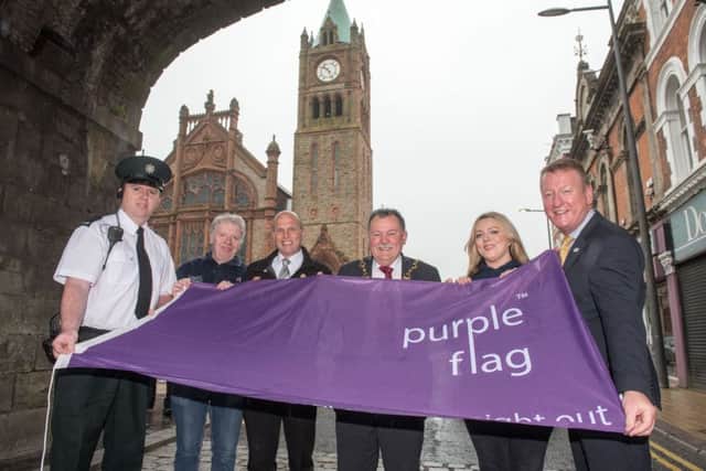 The Mayor Coucillor MaolÃosa McHugh pictured at the announcement that Derry has once again been awarded the Purple Flag. Included with PSNI representative are, Paul McCartney, First Housing Support, Jarleath Clarke, Estate Services, Racheal Eastwood, Grand Central and The Taphouse and City Centre Initiative Chief Executive Jim Roddy. Picture Martin McKeown. Inpresspics.com.