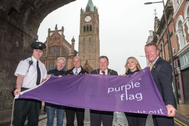 The Mayor Coucillor MaolÃ­osa McHugh pictured at the announcement that Derry has once again been awarded the Purple Flag. Included with PSNI representative are, Paul McCartney, First Housing Support,  Jarleath Clarke, Estate Services, Racheal Eastwood, Grand Central and The Taphouse and City Centre Initiative Chief Executive Jim Roddy. Picture Martin McKeown. Inpresspics.com.