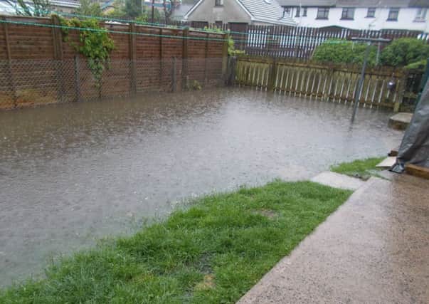Mr Moore's garden was flooded.
