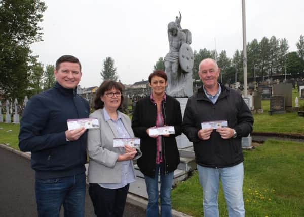 Councillor  Colly Kelly , Stella Coyle (sister of Volunteer Denis Heaney) Marie Rush, and Pius McNaught Derry Graves Association, at the Republican plot in the City Cemetery launching the annual draw