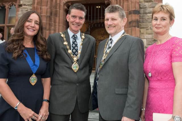 Councillor John Boyle, SDLP, who has been elected as the new Mayor of Derry City and Strabane District Council with his partner Angela and Councillor Derek Hussey, UUP Deputy Mayor and his wife, Karen. Picture Martin McKeown. Inpresspics.com. 04.06.18