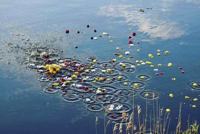 Last month to mark the first anniversary of his passing, Sam's relatives laid flowers at the spot along the River Foyle where the swimmer died in a tragic accident.