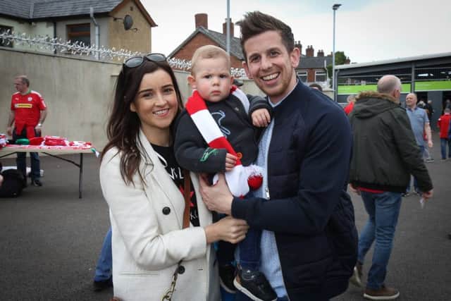 Eamonn Seydak pictured with his wife Louise and son Ethan at last year's Irish Cup Final when he was supporting Cliftonville.