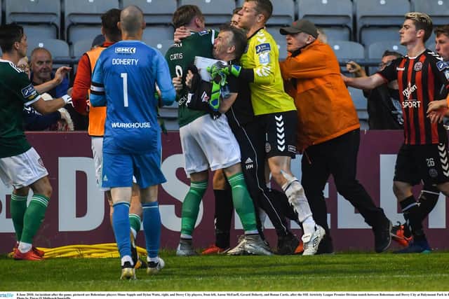An incident after the game, pictured are Bohemians players Shane Supple and Dylan Watts, right, and Derry City players, from left, Aaron McEneff, Gerard Doherty, and Ronan Curtis, after the SSE Airtricity League Premier Division match between Bohemians and Derry City at Dalymount Park