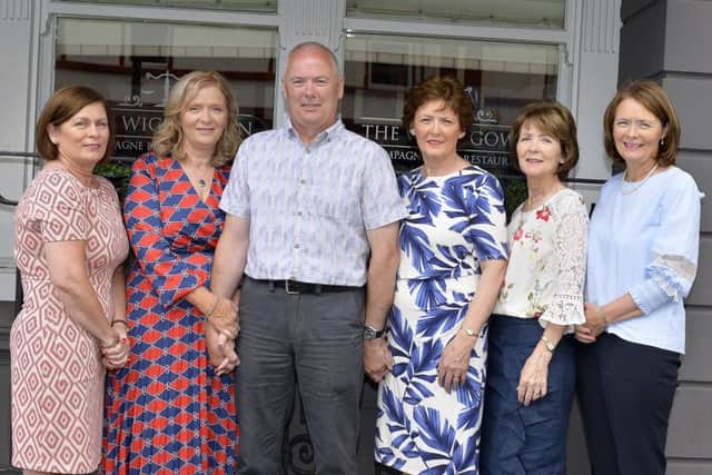NIFRS Station Commander Kevin Lynch pictured with sisters Carmel, Alice, Mairead, Catherine and Eilish at his recent retirement party held in the Bishops Gate Hotel.  Station Commander served over 30 years in the fire and rescue service. DER2318GS043