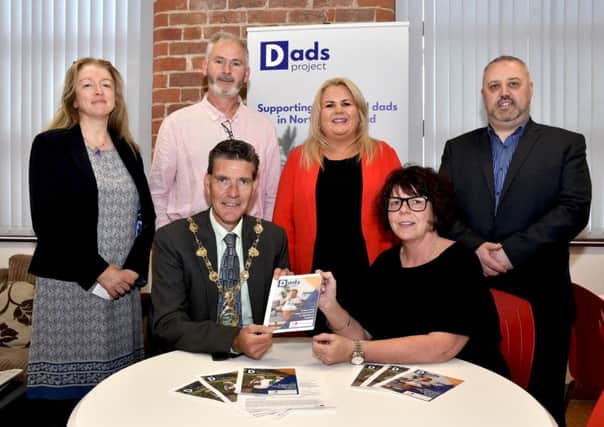 The Mayor, Councilllor John Boyle pictured at the launch of the Dads Project at People Plus NI in the City Factory building. Included are Muriel Bailey, seated, Director of Northern Ireland Family Services, and from left, Maria Herron, Families Together, Cahir Murray, Dads Project co-ordinator, Hayley Devine, key worker, Dads Project, and Nigel McCafferty, speaker. DER2418-115KM