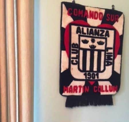 The Alianza Lima flag is pride of place in the parochial house in Rathmullan.