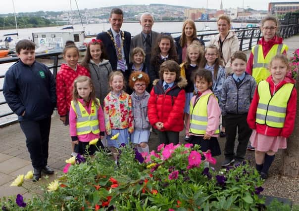 Mayor John Boyle and Danny McCartney, manager, grounds maintenance, Derry City & Strabane District Council, with pupils and teachers from St. Anne's PS, St. Patrick's PS, Broadbridge PS and Hollybush PS at the launch of the "Plants Ahoy" scheme.  (Photo - Tom Heaney, nwpresspics)