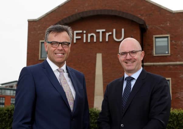 (L-R) are Alastair Hamilton, CEO of Invest NI and Darragh McCarthy, CEO of FinTrU (Phot by Darren Kidd/ PressEye)