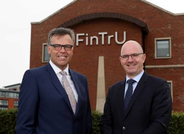 (L-R) are Alastair Hamilton, CEO of Invest NI and Darragh McCarthy, CEO of FinTrU (Phot by Darren Kidd/ PressEye)