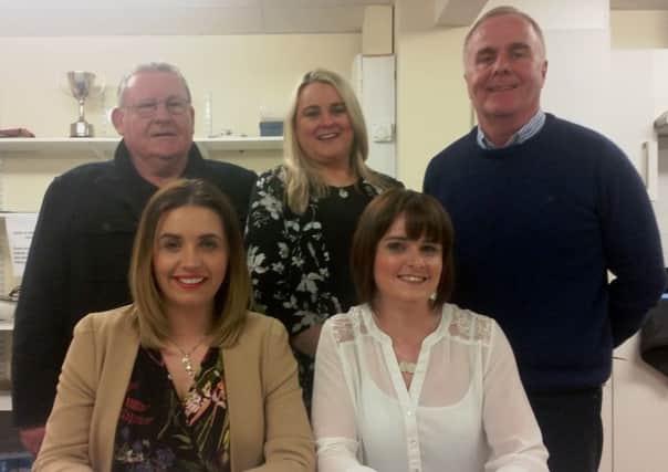Caoimhe McKnight (sitting, right)( with Sinn Fein colleagues.