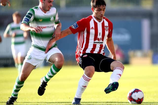 Blackburn loanee, Jack Doyle, pictured holding off the challenge of Joel Coustrain of Rovers, played his final match for Derry City at Tallaght.