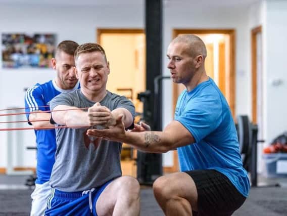 FF Fitness personal trainer, Seamus Fox takes some of his clients through their paces.