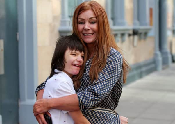 Charlotte Caldwell, mum of severely epileptic boy Billy who fought the government to secure life-saving medication, arrive in Belfast before heading to the family home in Tyrone.  Photos: Jonathan Porter/PressEye